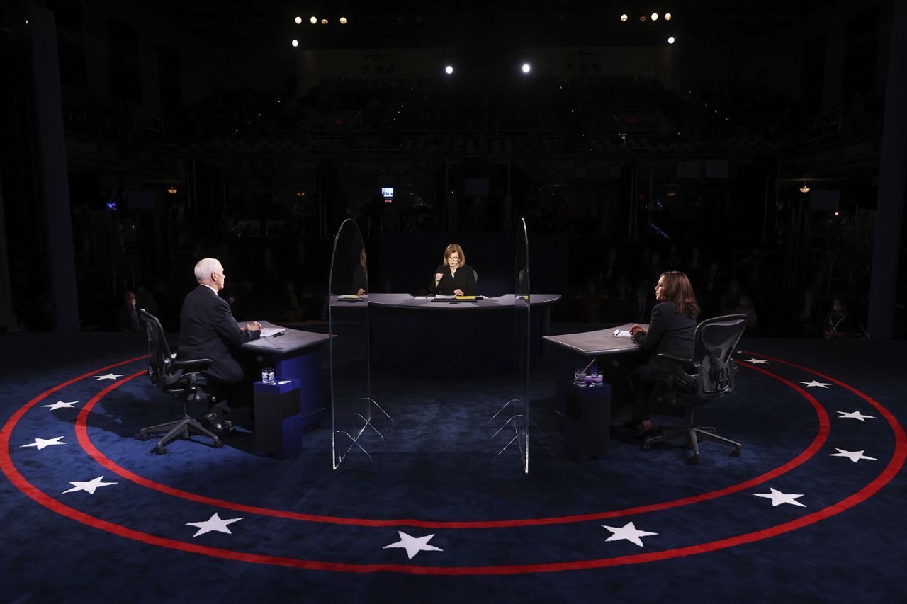 Vice President Mike Pence and Democratic vice presidential candidate Sen. Kamala Harris listens to a question from moderator USA Today Washington Bureau Chief Susan Page during the vice presidential debate on Wednesday in Salt Lake City. 