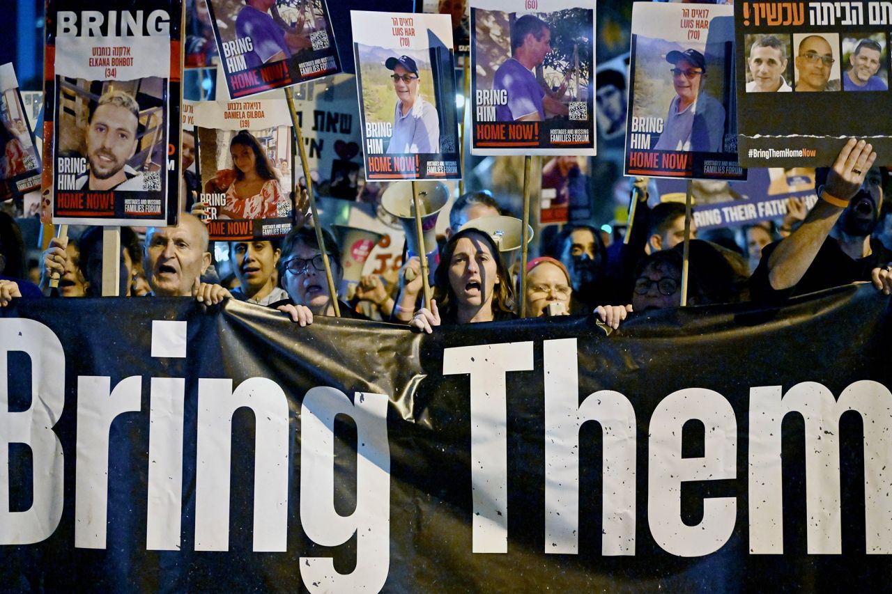 The families of hostages followed by hundreds of supporters march to the IDF headquarters calling for the return of all the remaining hostages on December 16 in Tel Aviv, Israel.