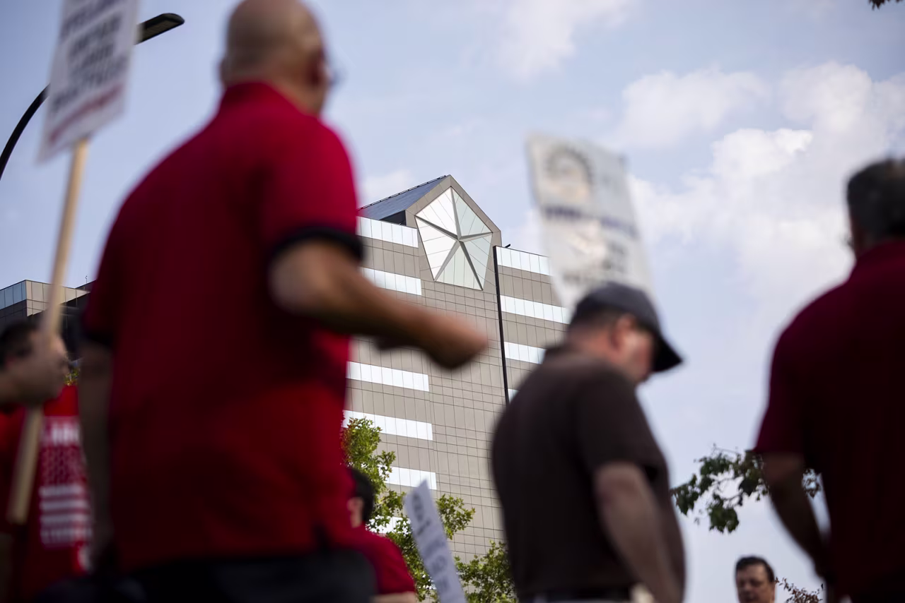 United Auto Workers members and supporters rally at the Stellantis North America headquarters on September 20 in Auburn Hills, Michigan. 