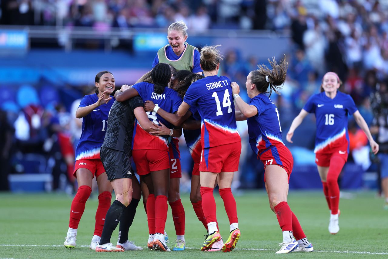 US players celebrate victory over Brazil in the women's gold medal match on August 10. 