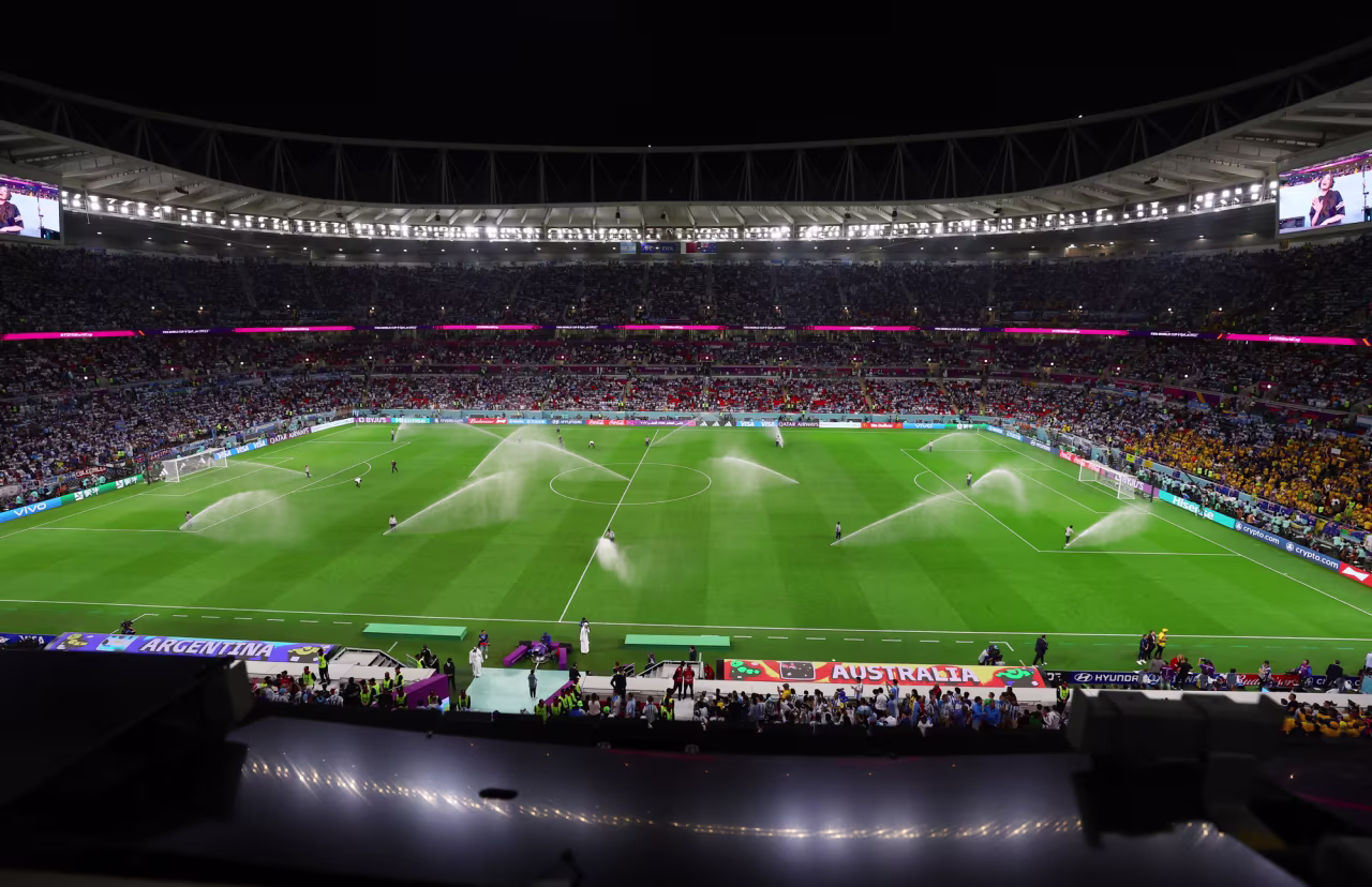 A general view of Ahmad bin Ali Stadium in Al Rayyan, Qatar, as sprinklers water the grass before the match on Saturday.