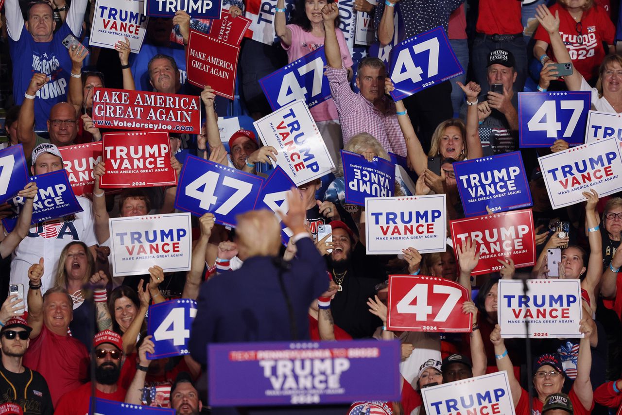 Republican Presidential candidate, former President Donald Trump waves to supporters after speaking during a campaign rally in Wilkes Barre, Pennsylvania on August 17.