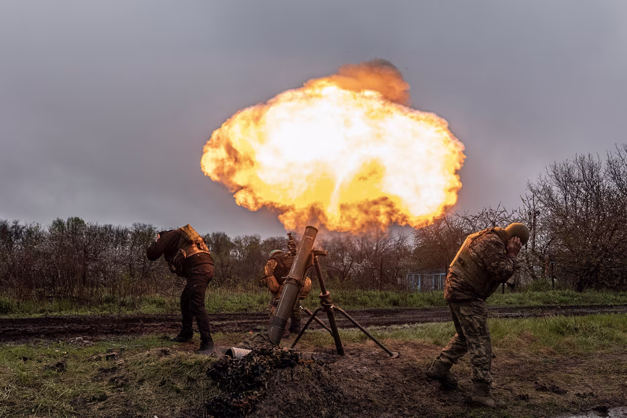 Ukrainian soldiers fire a mortar in the direction of Bakhmut, Ukraine, on April 20. 