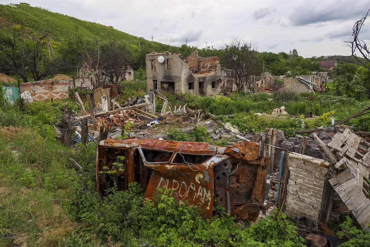 A residential building destroyed during the bombardment by Russian aircraft in the village of Kupyansk-Vuzlovyi, Ukraine on June 28. 