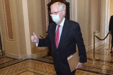 Senate Majority Leader Mitch McConnell walks to the Senate floor on Monday.