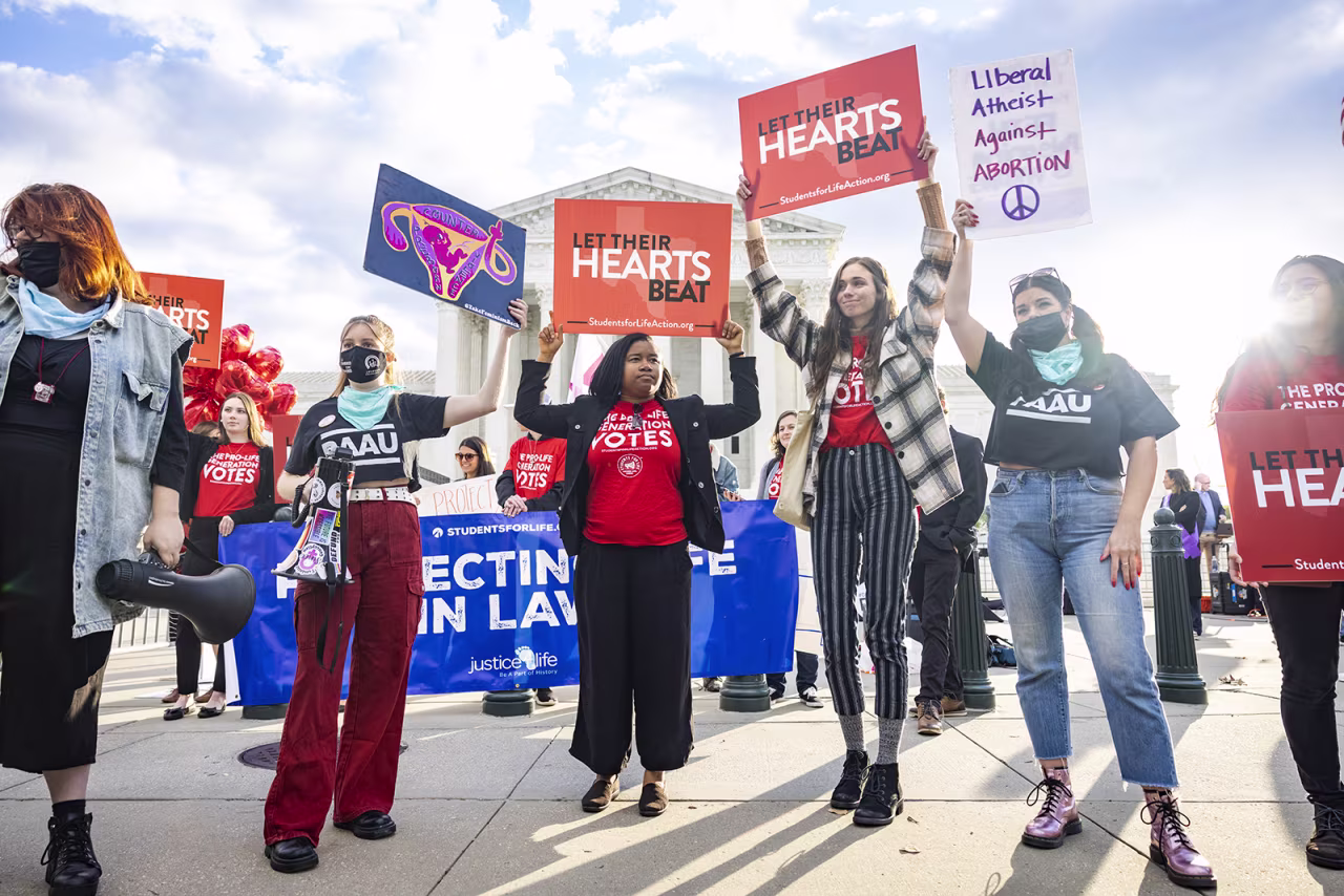 Anti-abortion protesters gather outside the U.S. Supreme Court on Monday.
