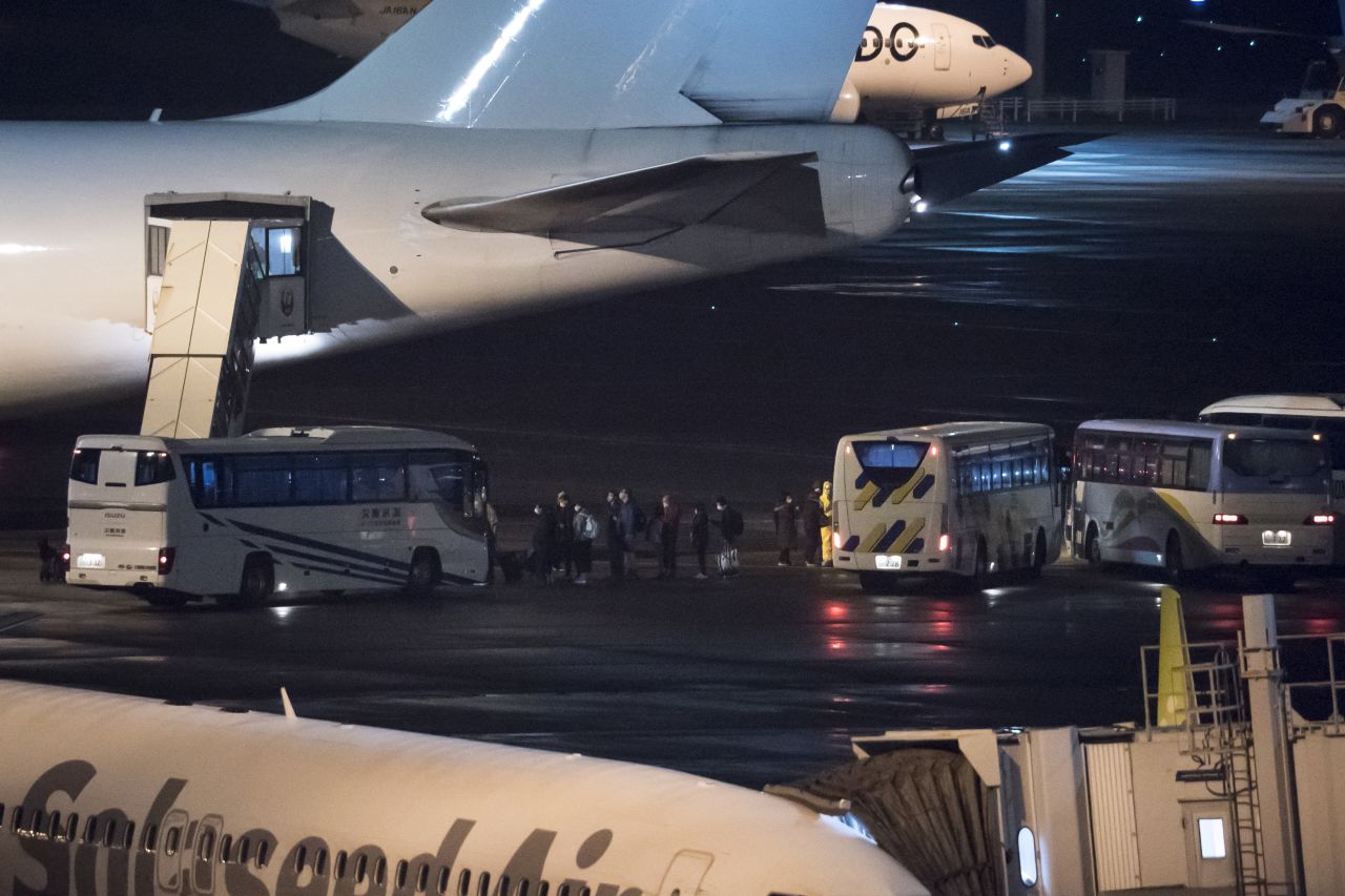 American citizens board a US-chartered evacuation plane on February 17, 2020 in Tokyo, Japan.