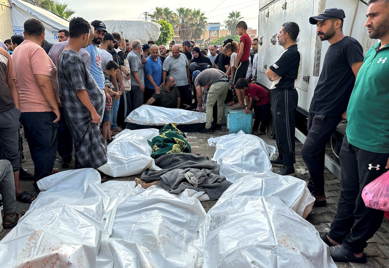 Mourners gather next to the bodies of Palestinians killed in Israeli strikes during their funeral at Al-Aqsa hospital in Deir Al-Balah, Gaza, on June 5.