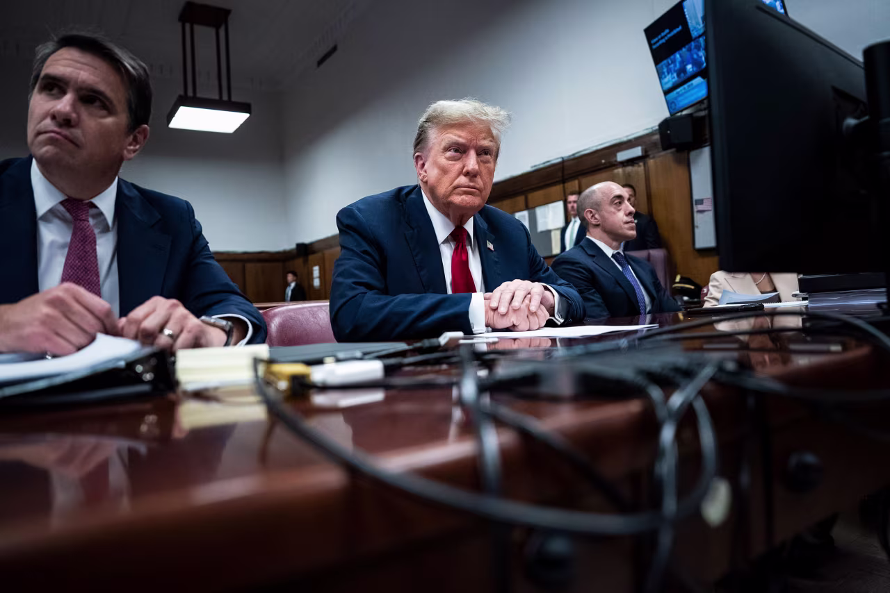 Former President Donald Trump appears with his legal team Todd Blanch and Emil Bove before the start of his trial in Manhattan Criminal Court on Monday, April 15.