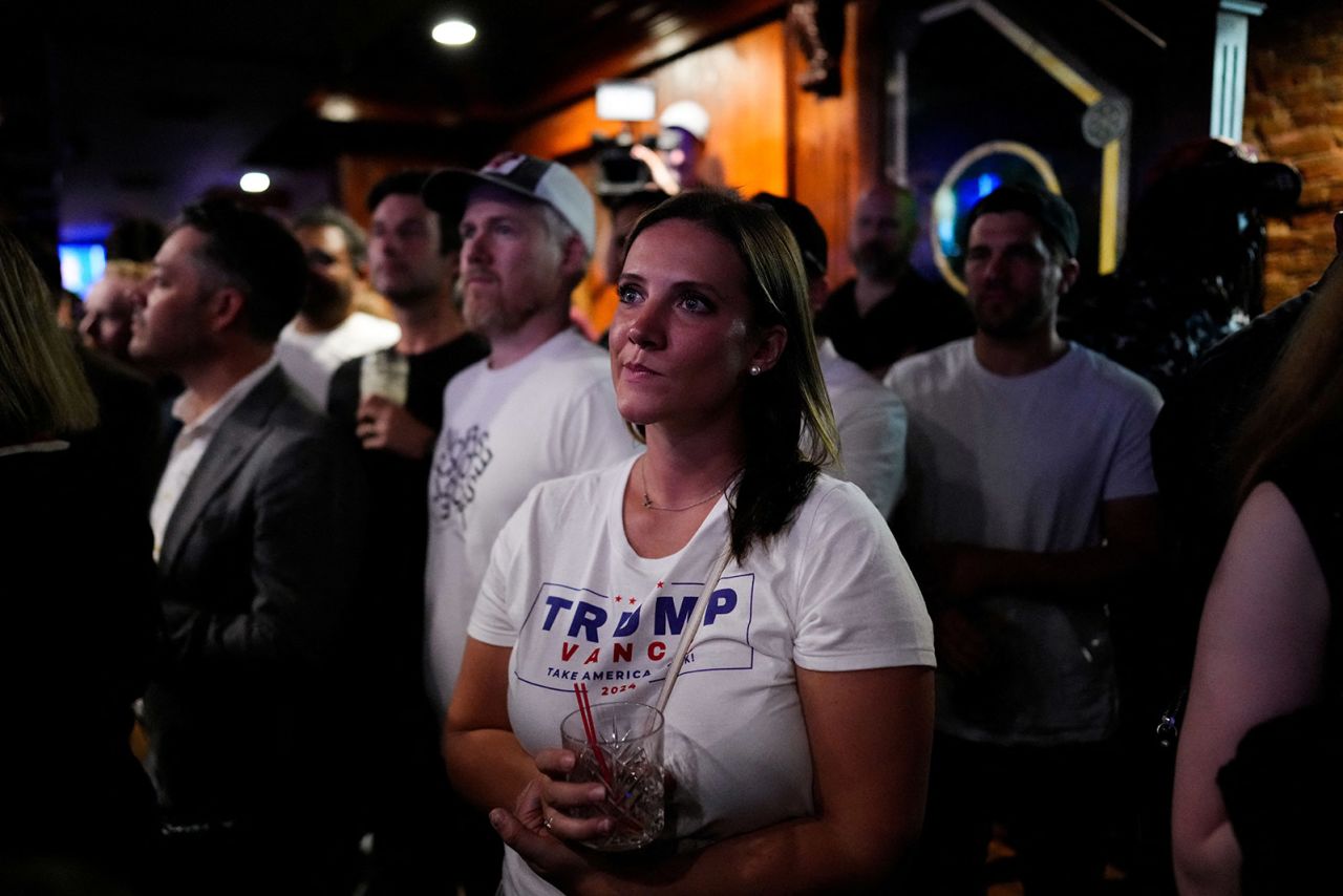 People attend a debate watch party hosted by the New York Young Republican Club in New York City.