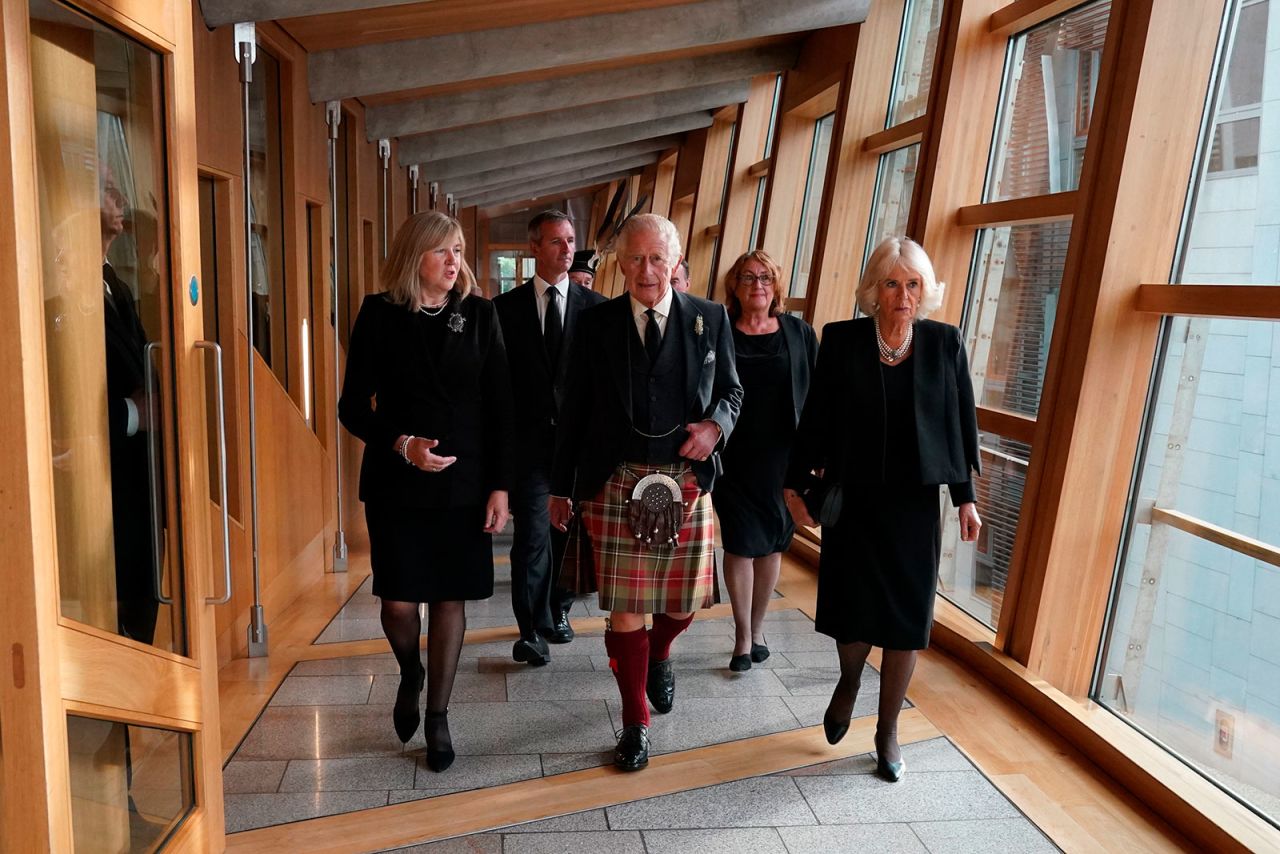 King Charles III and Camilla, the Queen Consort, right, visit the Scottish Parliament?on Monday, September 12. 