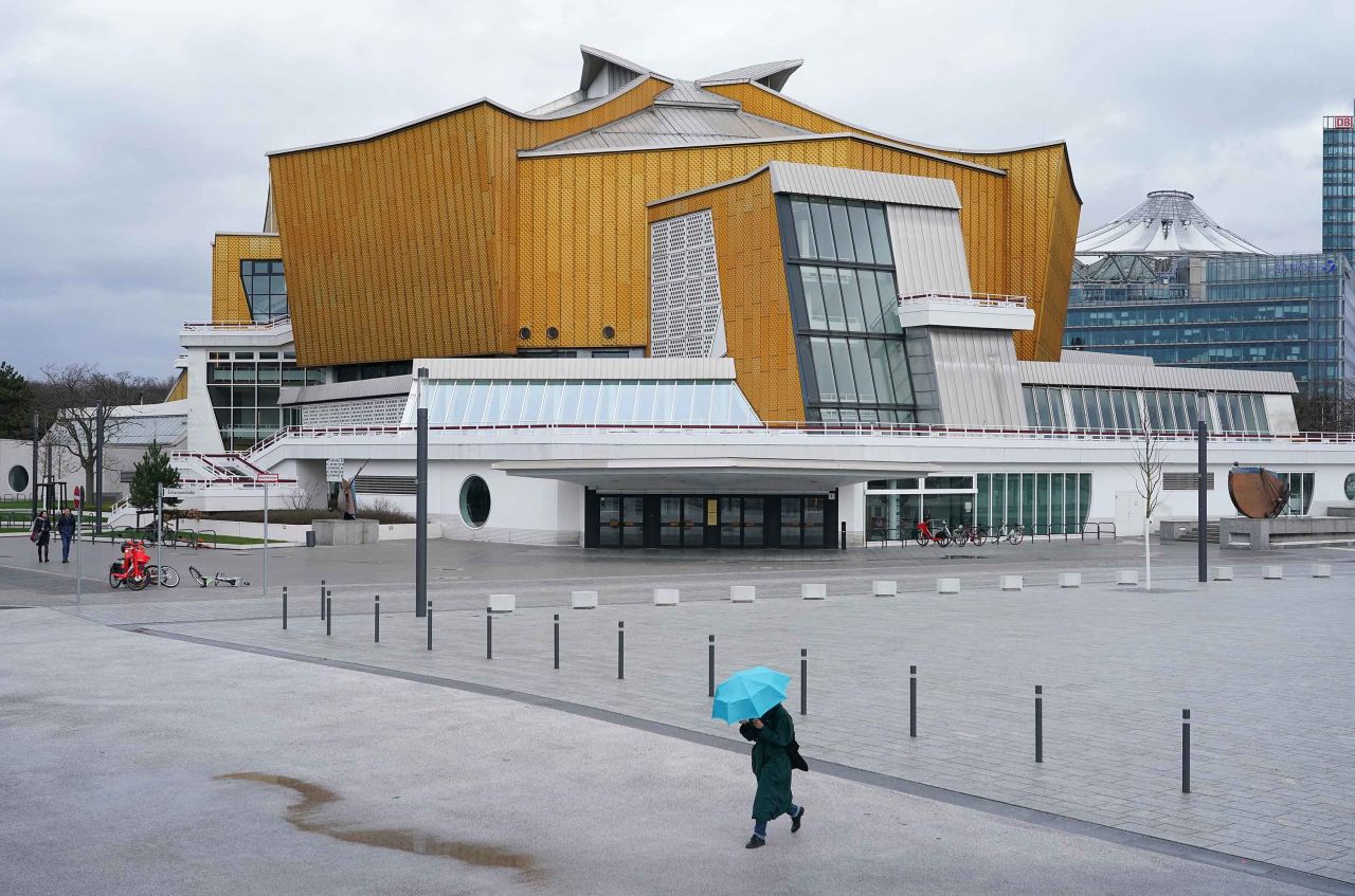 A person walks past the Berliner Philharmonie concert hall in Berlin, Germany, on Thursday.