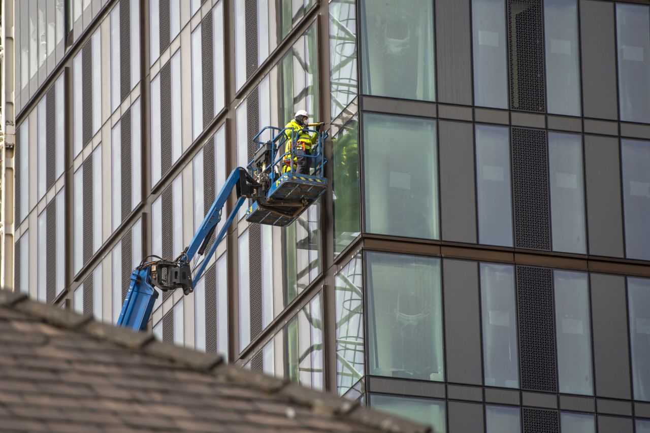 Construction work continues in the business district of Manchester, England, on May 11. 
