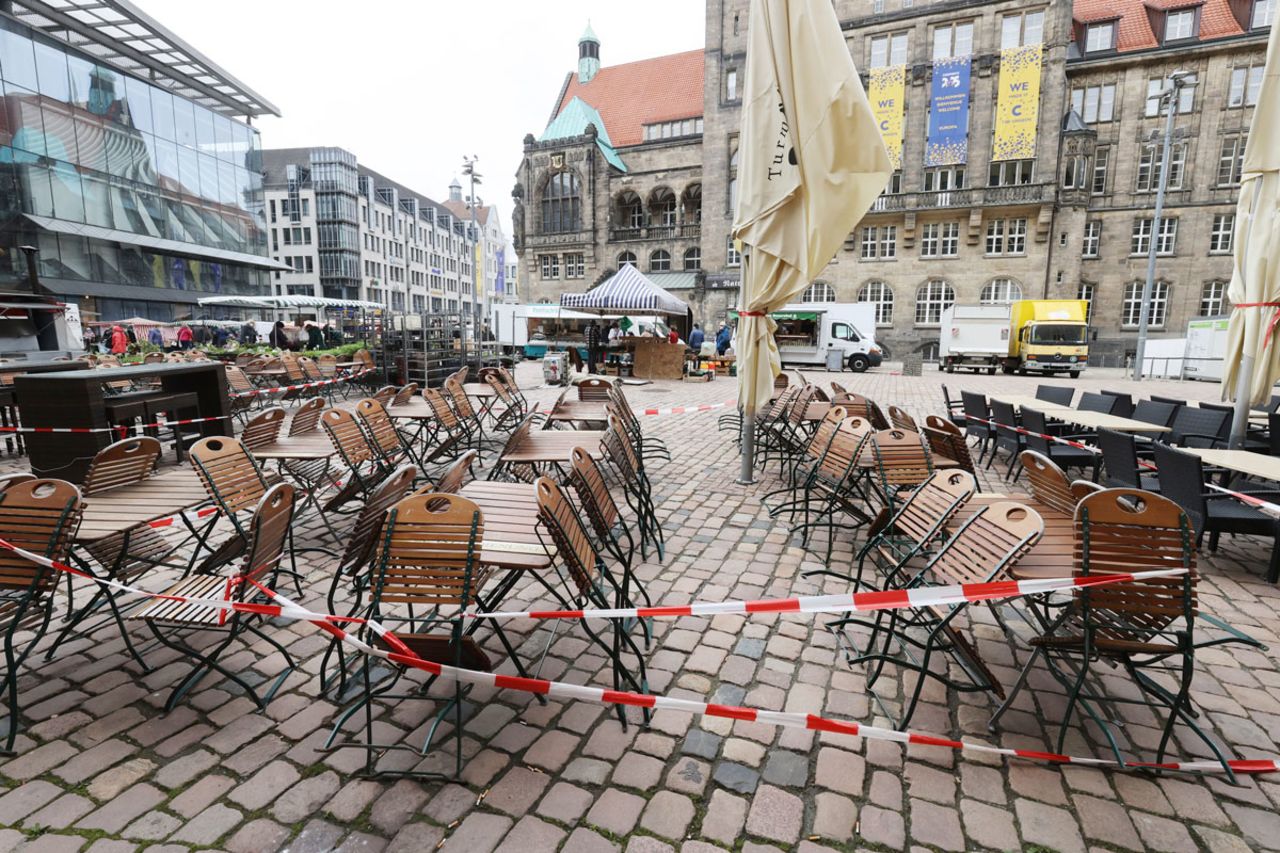 Empty tables and chairs are cordoned off outside a downtown restaurant during the lockdown in Chemnitz, Germany on May 6.