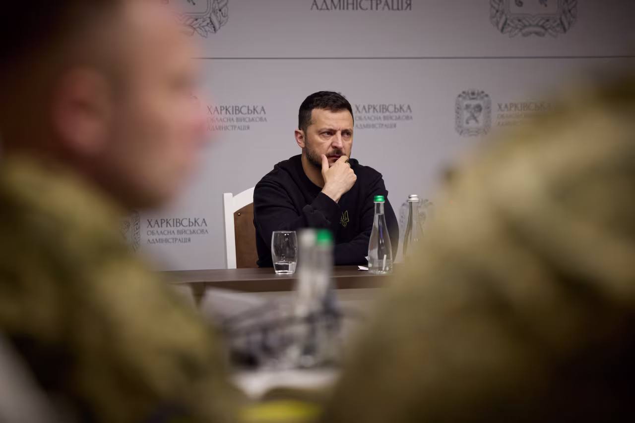 President Zelenskiy attends a meeting with top military officials in Kharkiv, Ukraine, on Thursday. 