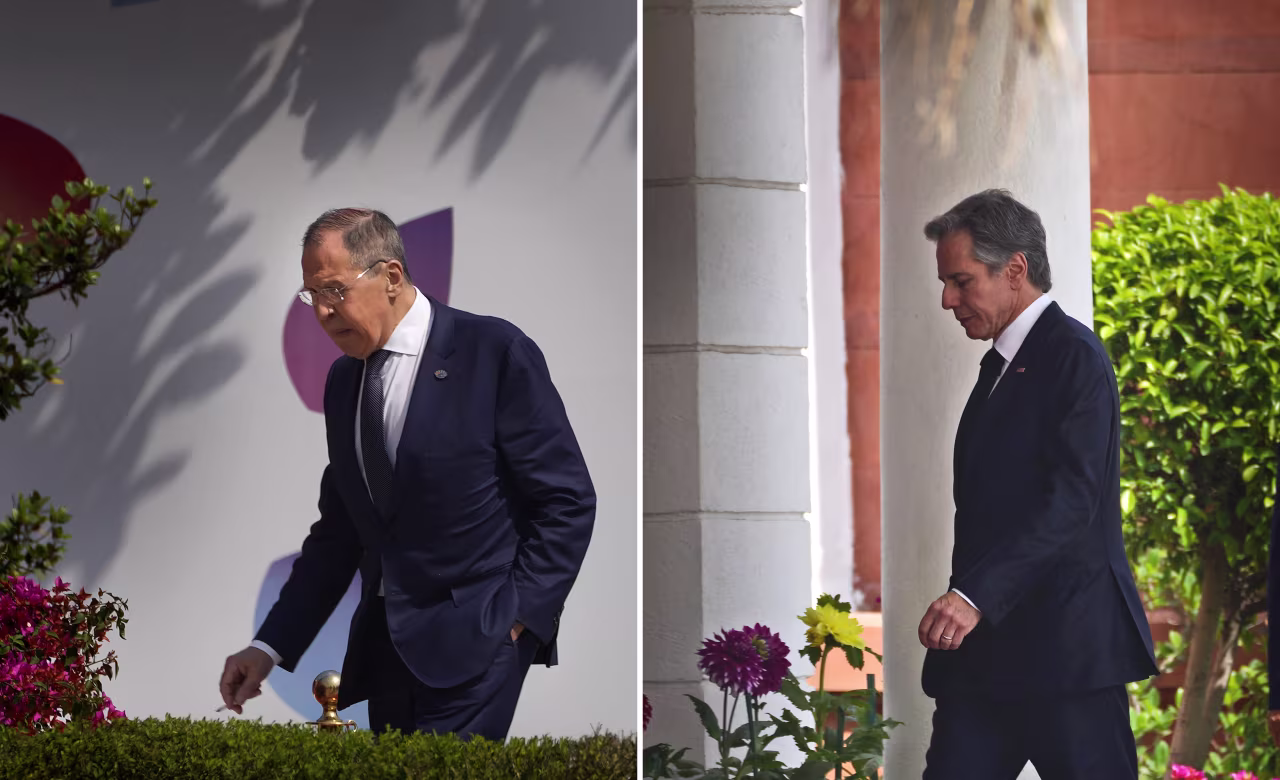 This combination of photos shows U.S. Secretary of State Antony Blinken, right, and Russian Foreign Minister Sergey Lavrov, left, walk to attend second session of the G20 foreign ministers' meeting, respectively, in New Delhi, India, on March 2.