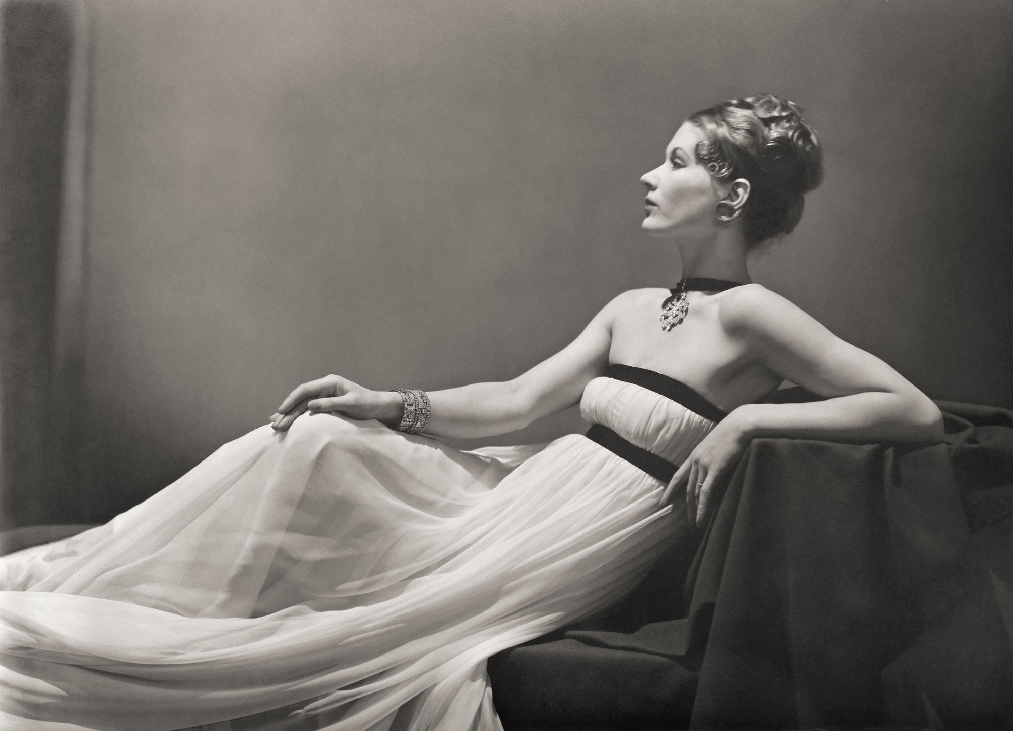 Lisa Fonssagrives-Penn reclining on a chaise longue in Paris in 1938. The model’s husband photographer Irving Penn reportedly coveted the shot.