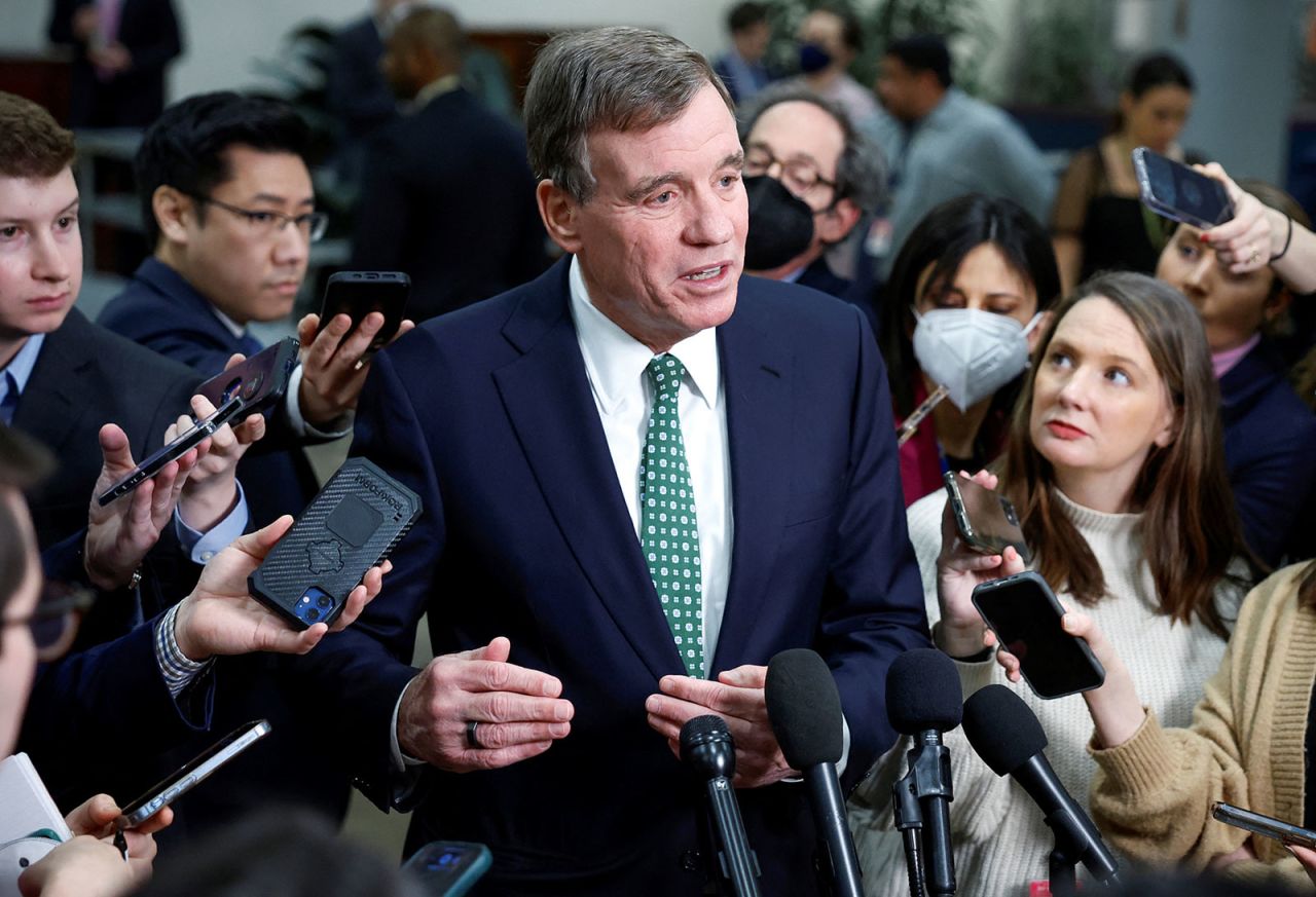 Democratic Senator Mark Warner speaks to the media on Capitol Hill in Washington, DC, on February 14. 