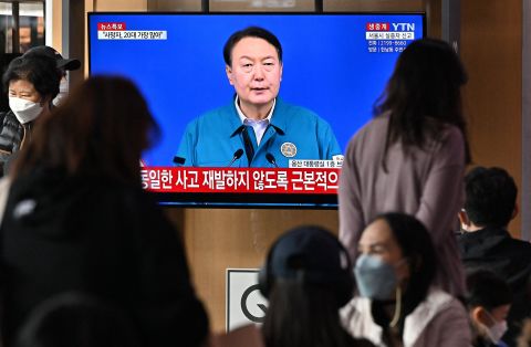 A live broadcast of South Korean President Yoon Suk Yeol is displayed in Seoul on Sunday morning, October 30.