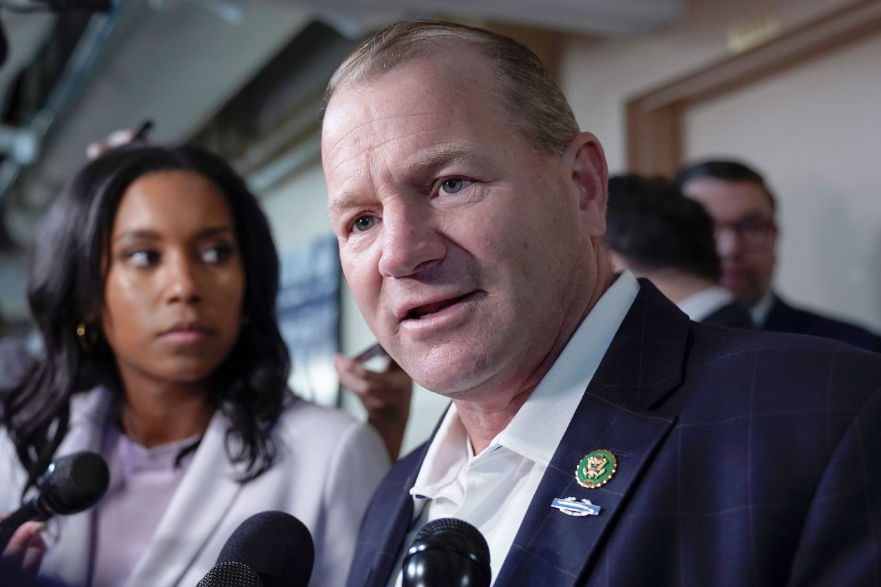 Rep. Troy Nehls talks with reporters as he arrives for a House Republican caucus meeting on Capitol Hill on October 12.