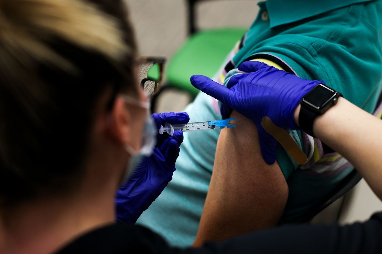 A patient receives a dose of the Johnson & Johnson Covid-19 vaccine on March 6, in Thornton, Colorado. 