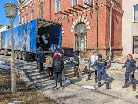 Aid supplies are unloaded in Sumy, Ukraine, on March 18.