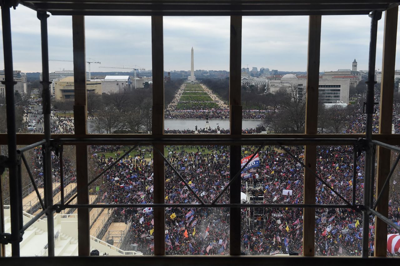 Supporters of President Donald Trump are seen from behind scaffolding as they gather outside the US Capitol's Rotunda on January 6 in Washington, DC. 