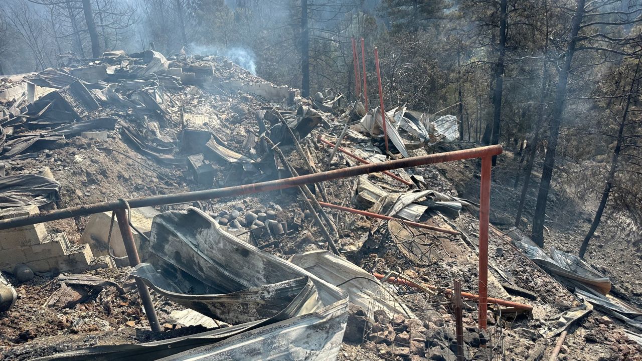 A destroyed house belonging to his friend is seen on Wednesday.