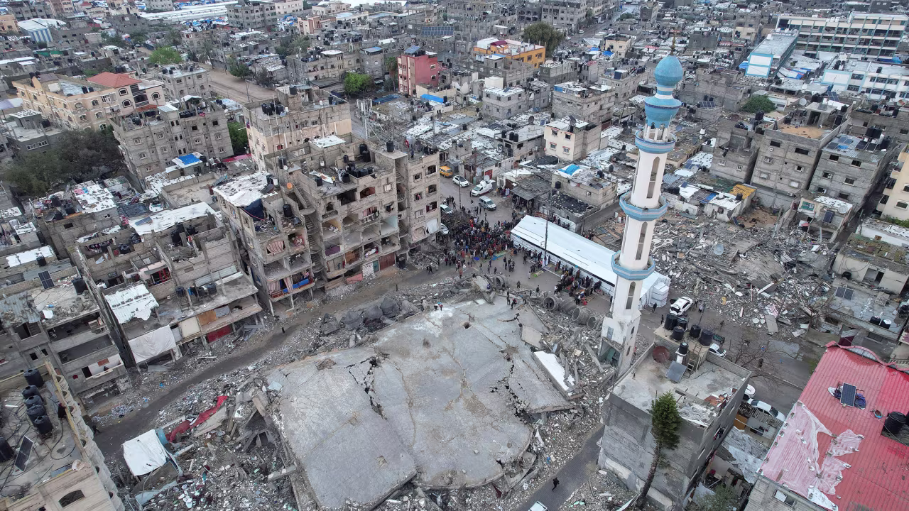 Muslims holding Eid al-Fitr prayers by the ruins of al-Farouk mosque in Rafah, Gaza, on April 10.