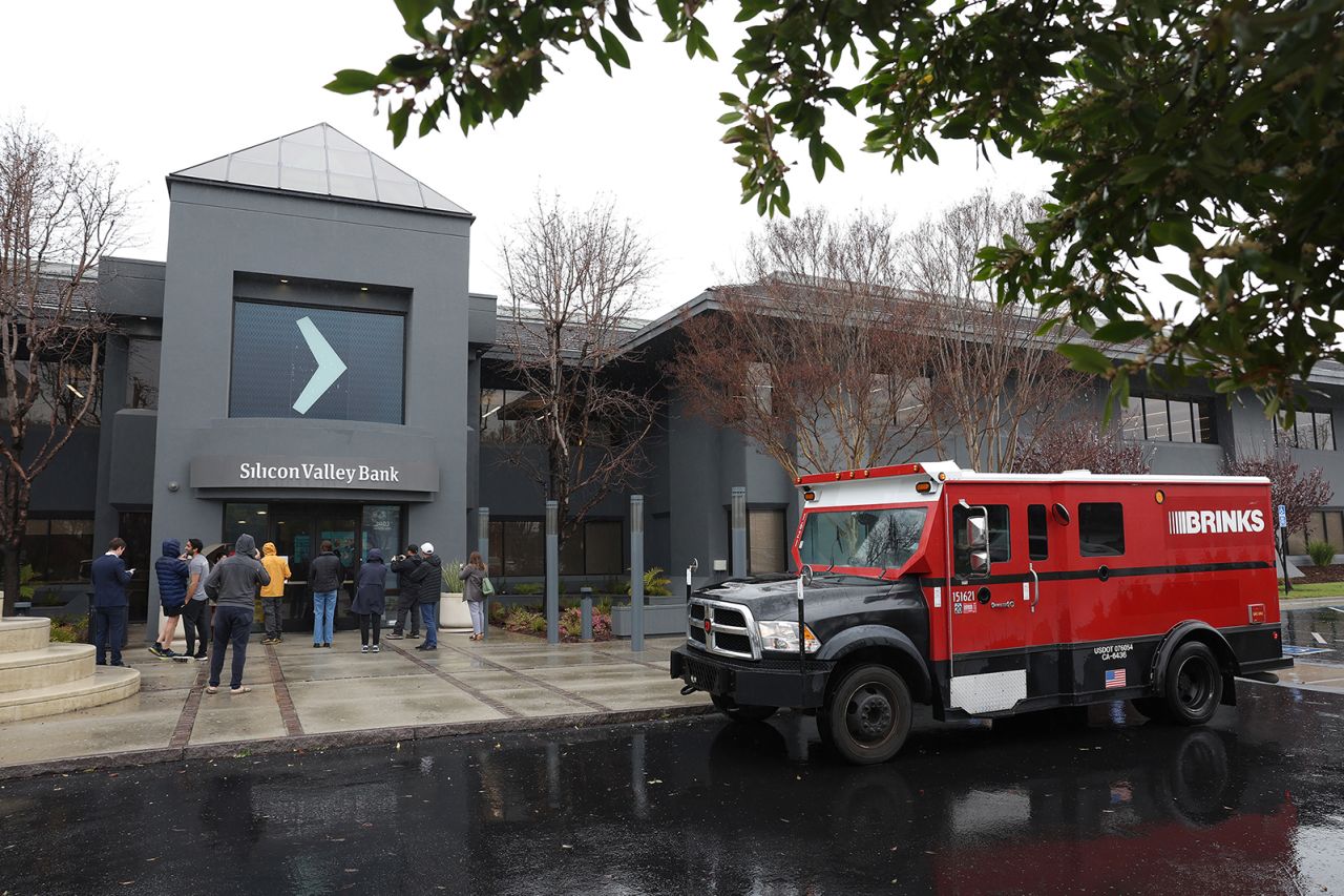 A Brinks armored truck sits parked in front of the shuttered Silicon Valley Bank (SVB) headquarters on March 10, 2023 in Santa Clara, California. 