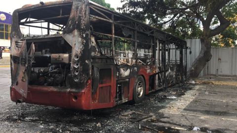 A burnt-out bus, also in the capital Wednesday morning.