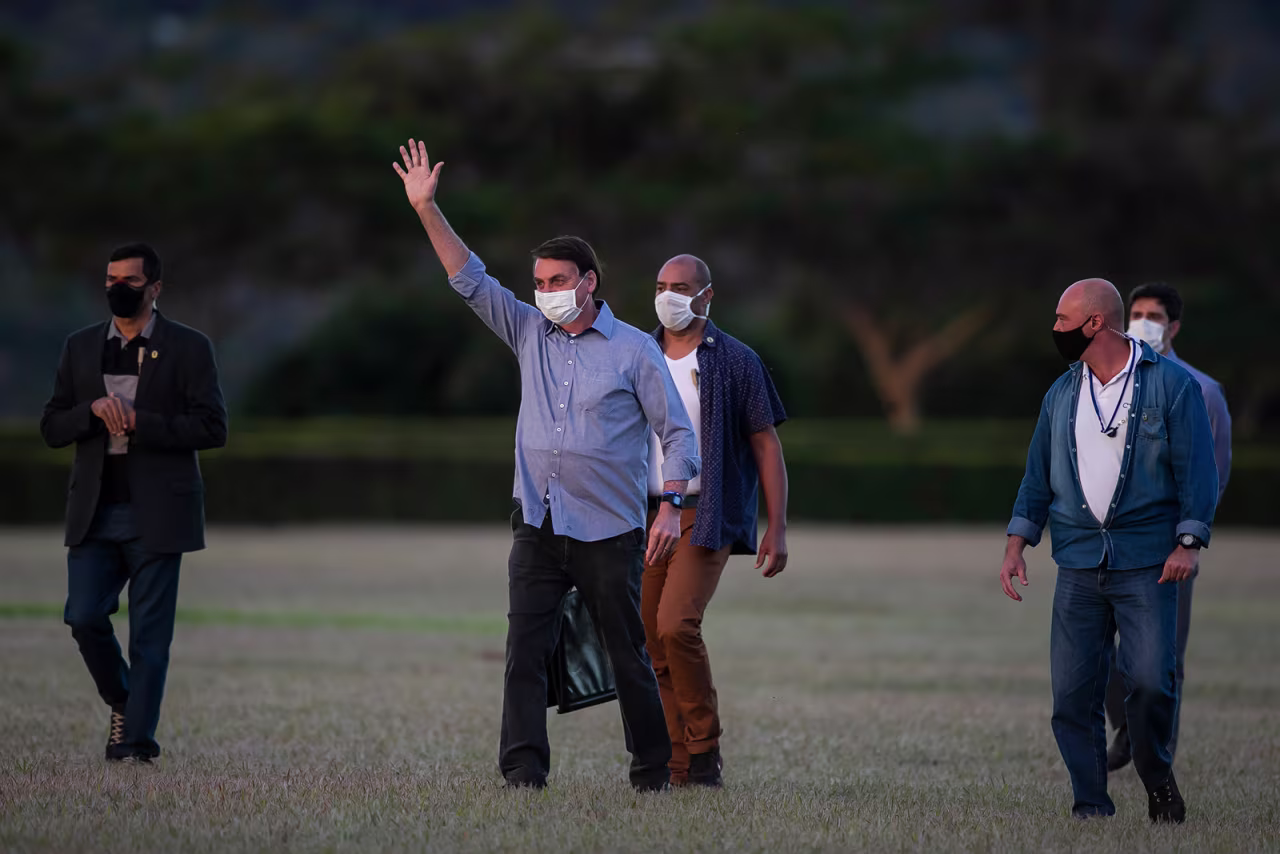 Jair Bolsonaro President of Brazil gestures in front of the official residence after testing positive for coronavirus in Alvorada Palace on July 19, in Brasilia, Brazil. 
