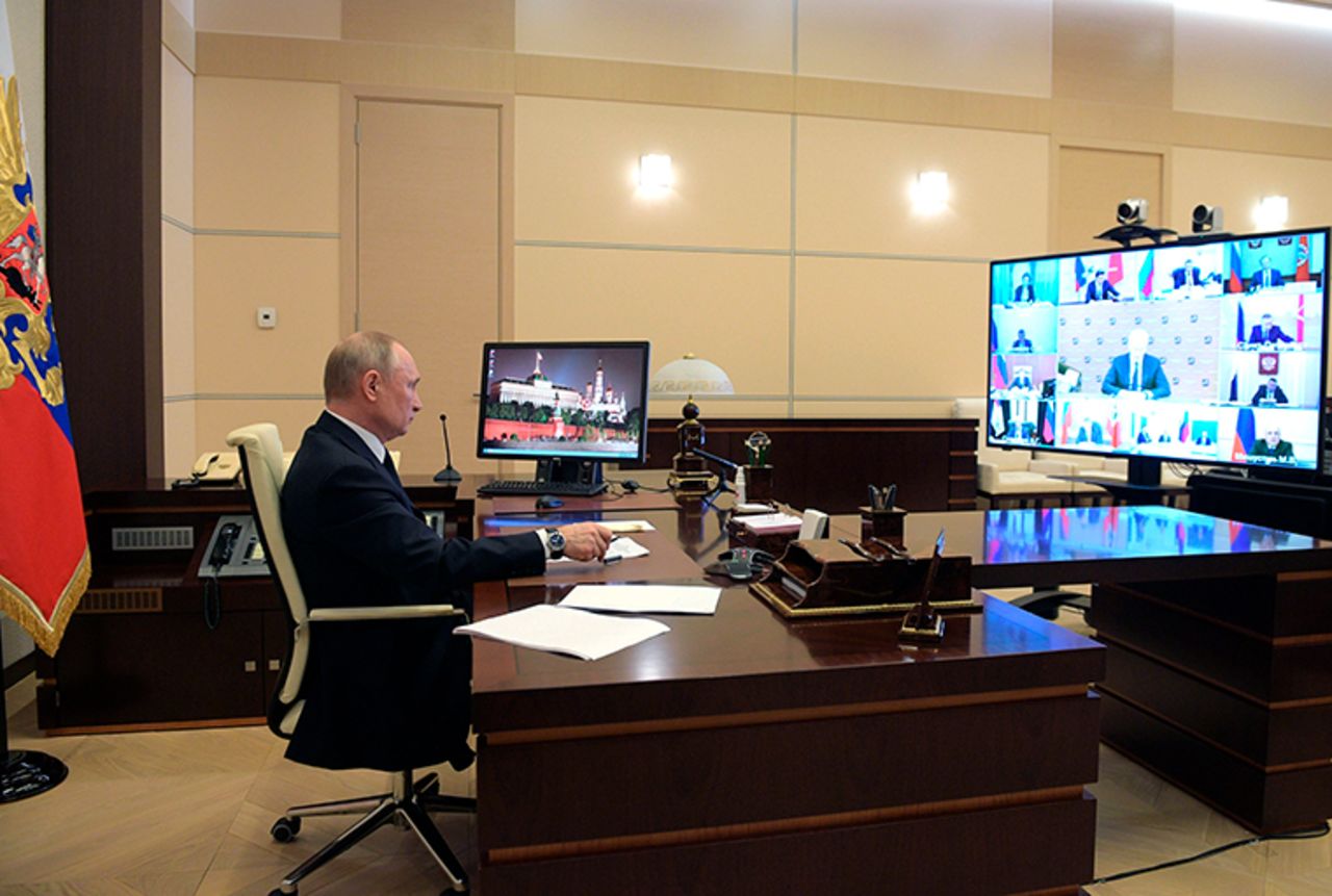 Russian President Vladimir Putin attend a meeting via video conference with heads of local governments at the Novo-Ogaryovo residence outside Moscow, Wednesday, April 8. 