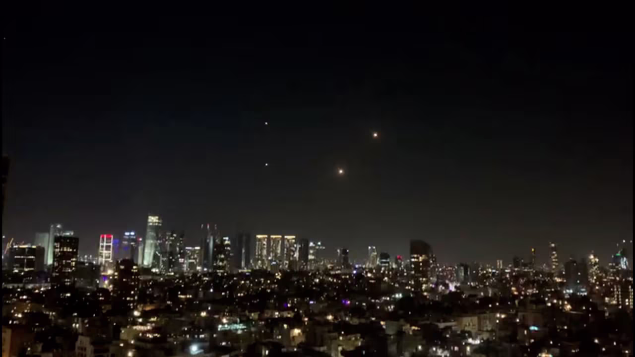 The Iron Dome defense system launches interceptors as sirens warn of incoming rockets over central Tel Aviv, Israel, on Saturday, December 2.