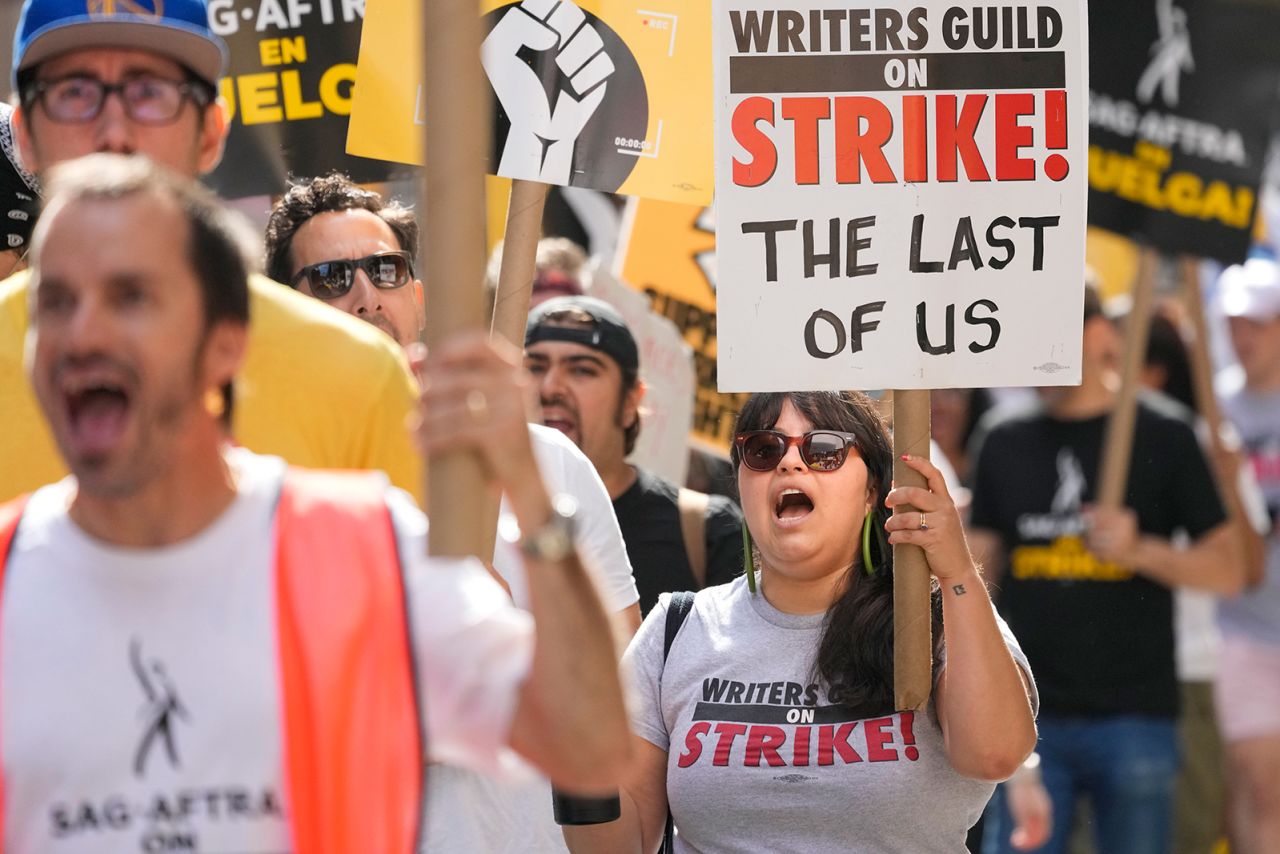 Strikers walk a picket line outside Warner Bros., Discovery, and Netflix offices in Manhattan on August 18, 2023.?