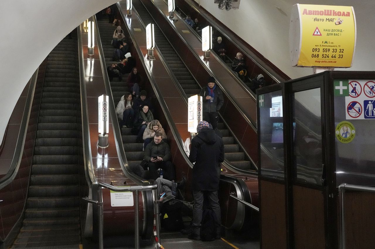 People shelter in a subway station during a rocket attack in Kyiv, Ukraine, on December 29.