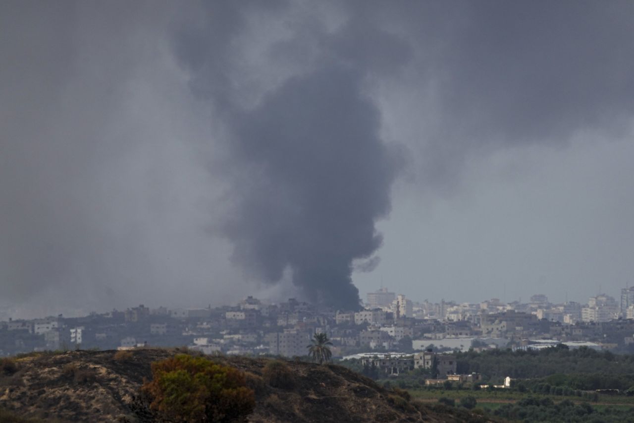 Smoke rises following an Israeli airstrike in Gaza, as seen from southern Israel, on October 17. 