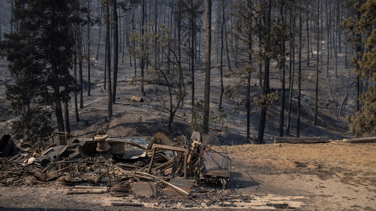 The remains of a residence are seen destroyed in the aftermath of the South Fork fire in Alto, New Mexico, on June 19