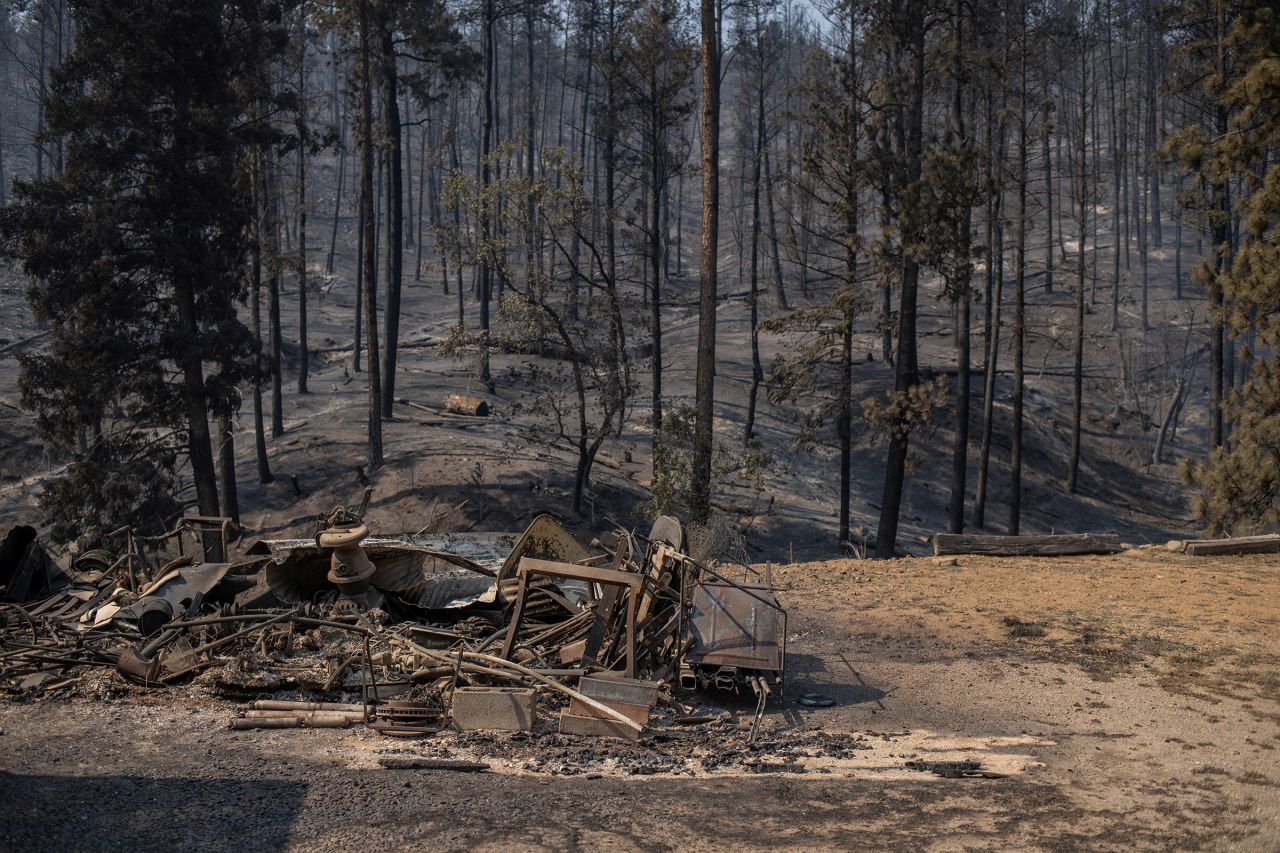 The remains of a residence are seen destroyed in the aftermath of the South Fork fire in Alto, New Mexico, on June 19