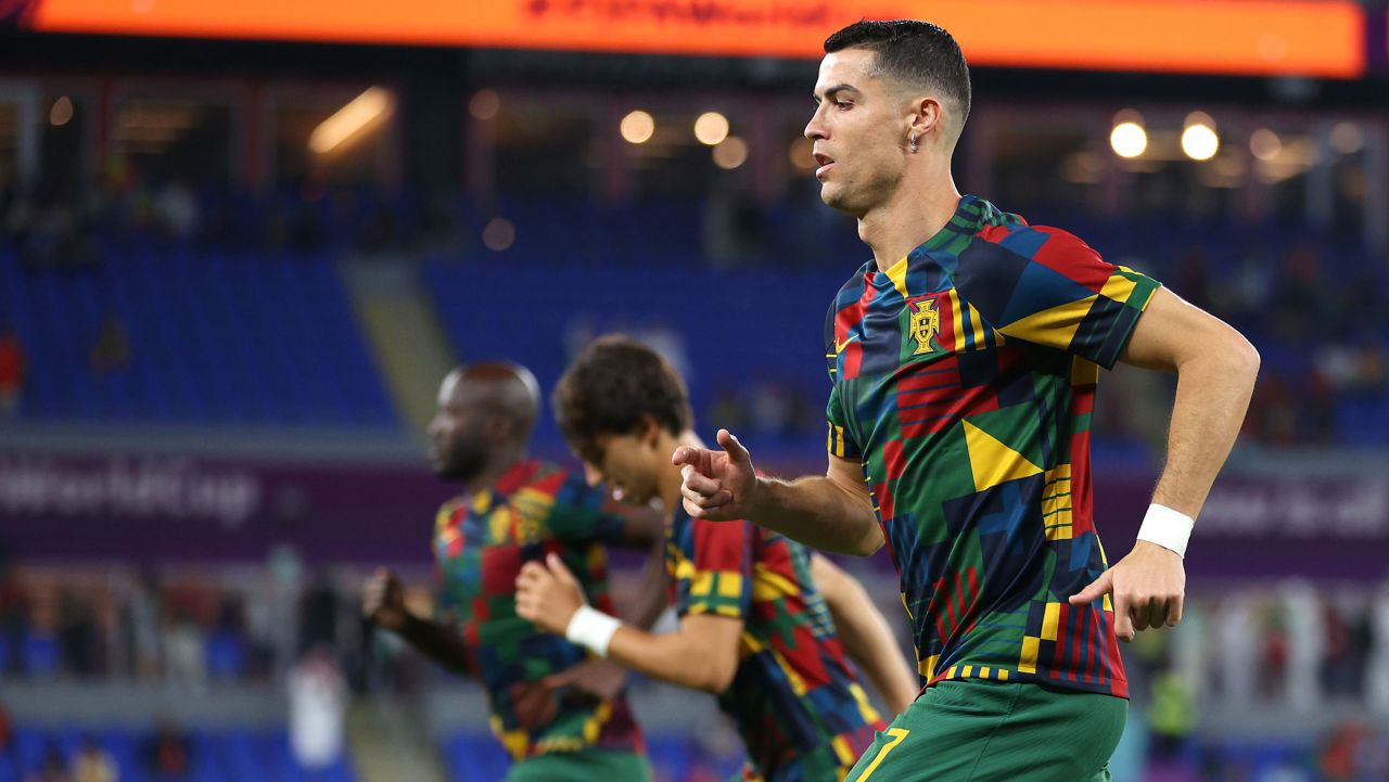 Portugal star Cristiano Ronaldo, right, warms up before Thursday's match against Ghana.