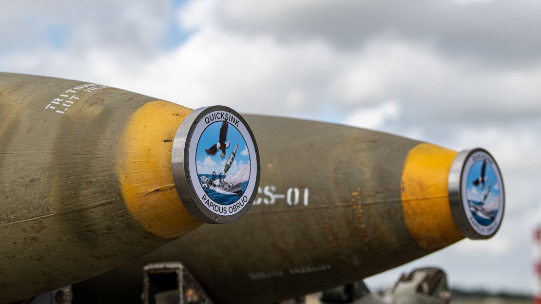 Two GBU-31 Joint Direct Attack Munitions with QUICKSINK adaptions are laid out in preparation to load onto an F-15E Strike Eagle at Royal Air Force Lakenheath, England, Sept. 7, 2022.