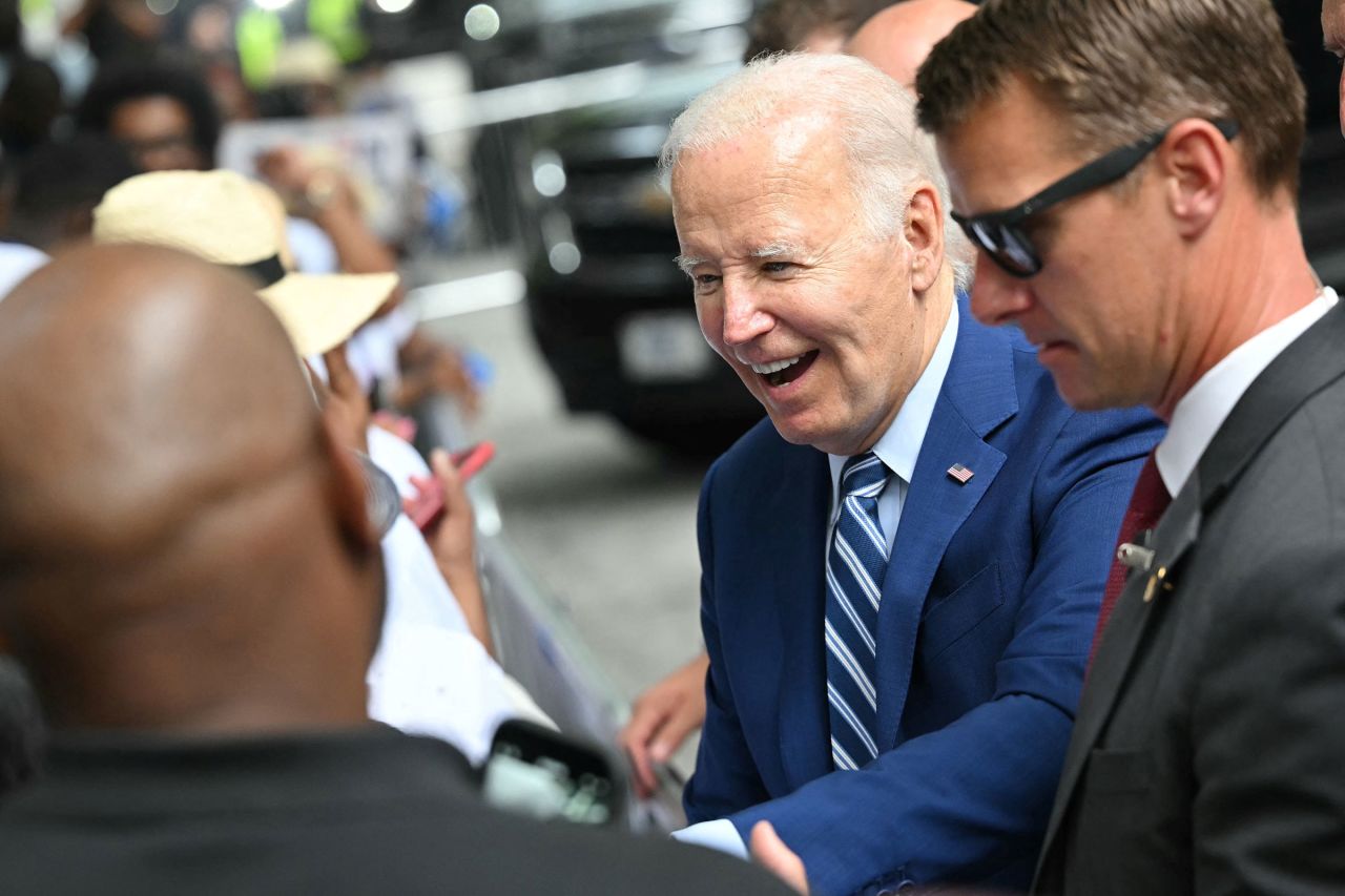 President Joe Biden greets supporters outside his hotel ahead of the first presidential debate of the 2024 elections at CNN's studios in Atlanta on June 27. 