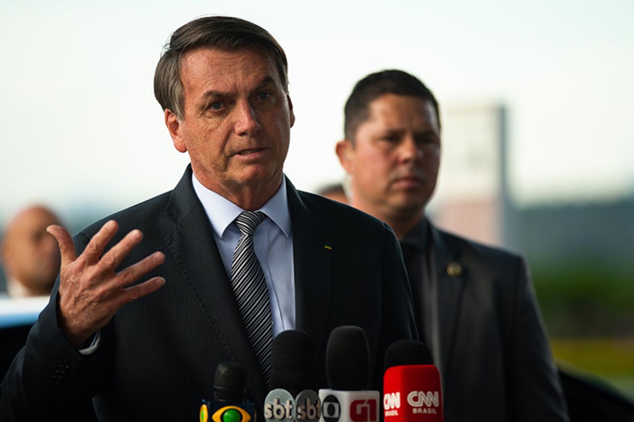 Brazilian President Jair Bolsonaro speaks with press on Tuesday March, 17,  in Brasilia, Brazil. 