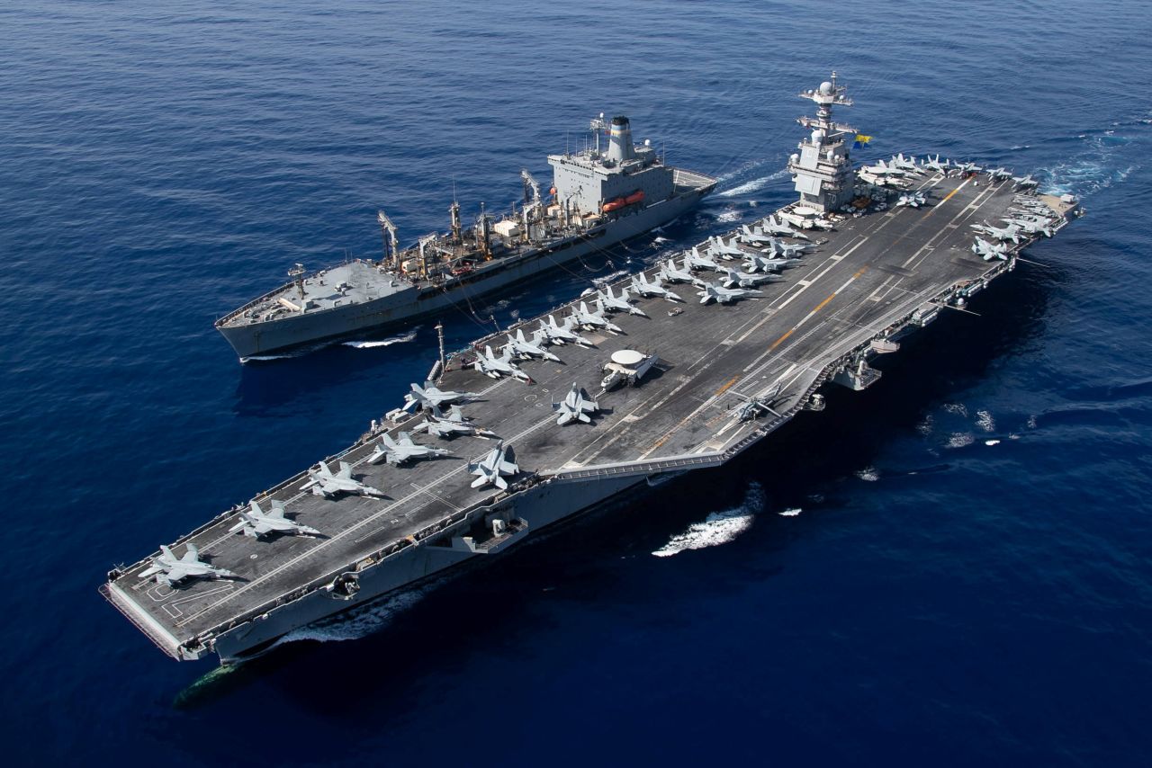 The world’s largest aircraft carrier USS Gerald R. Ford steams alongside USNS Laramie (T-AO-203) during a fueling-at-sea in the eastern Mediterranean Sea, as a scheduled deployment in the U.S. Naval Forces Europe area of operations, deployed by U.S. Sixth Fleet to defend U.S., allied, and partners interests, in this photo taken on October 11, 2023.