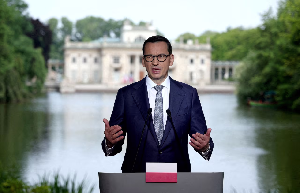 Polish Prime Minister Mateusz Morawiecki attends a press conference in Warsaw on July 5.