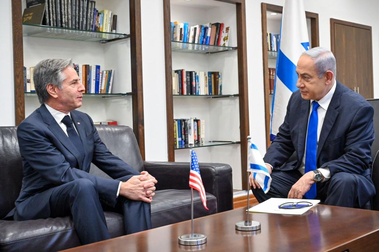 Israeli Prime Minister Benjamin Netanyahu, right, talks to US Secretary of State Anthony Blinken at the Kirya military base in Tel Aviv, Israel, on January 9.