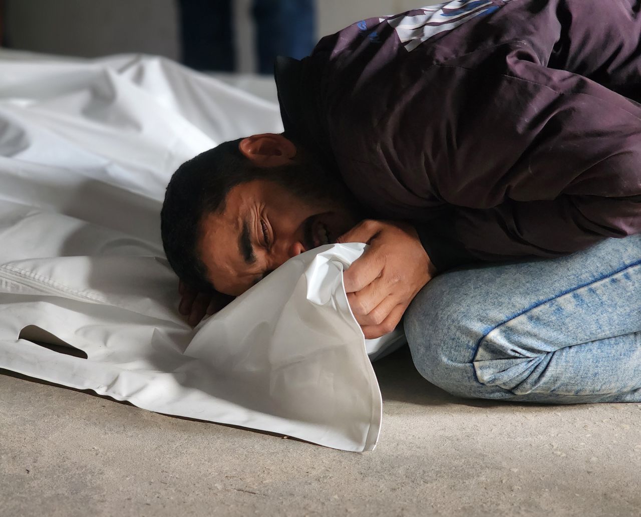 Relatives of Palestinians killed in Israeli attacks on Rafah mourn in Rafah, Gaza on Monday.