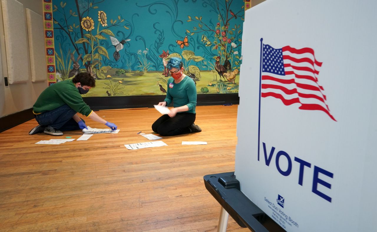 Election workers organize absentee ballots at the Wil-Mar Neighborhood Center in Madison, Wisconsin on April 7.