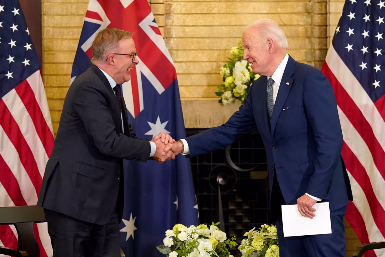 US President Joe Biden, right, shakes hands with Australian Prime Minister Anthony Albanese at a bilateral meeting alongside the Quad Summit at Kantei Palace, in Tokyo, on Tuesday.