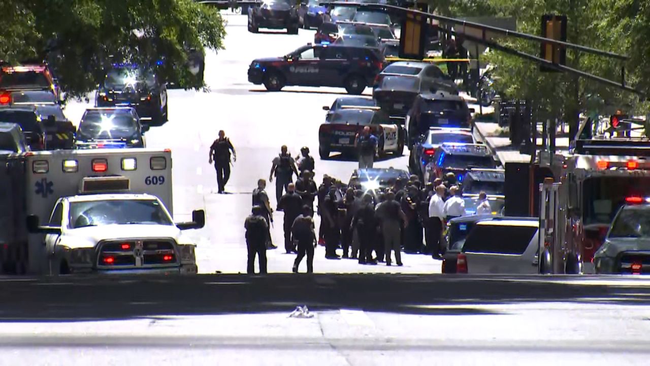 Emergency personnel respond to the scene of a shooting Wednesday at a building in Midtown Atlanta. 